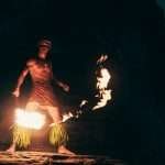 Mesmerizing Polynesian fire dance performed at night, capturing cultural traditions and vibrant artistry.