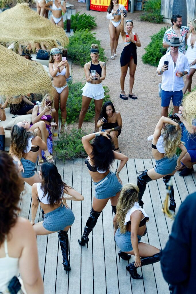 Choreographed dance performance surrounded by guests, Ibiza private party