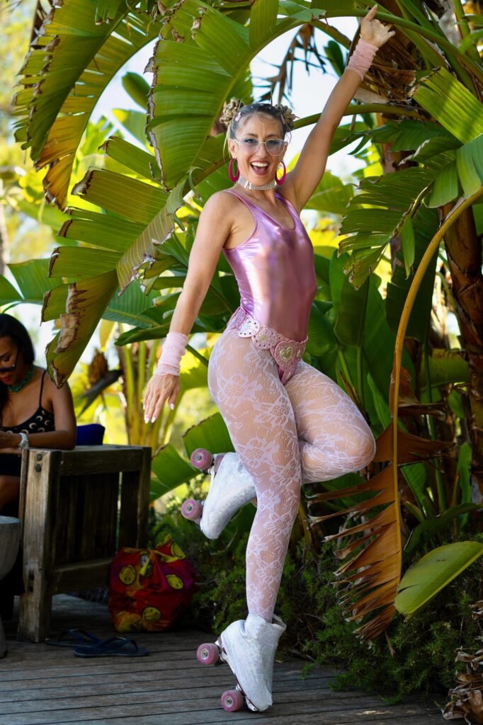 Roller-skating performers serving champagne, Ibiza themed entertainment