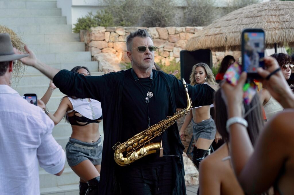 Dancers with live saxophone and violin duo, Ibiza villa entertainment