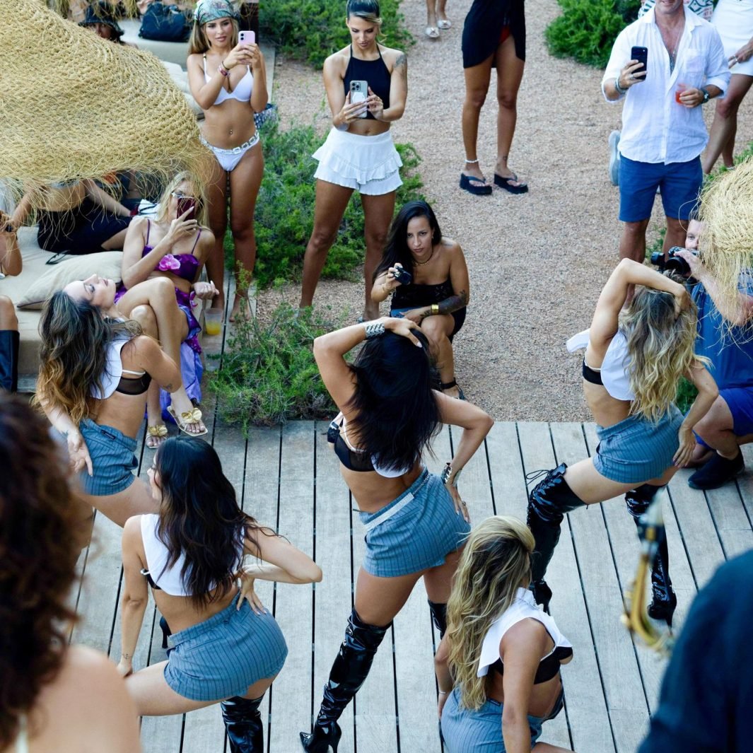 Choreographed dance performance surrounded by guests, Ibiza private party